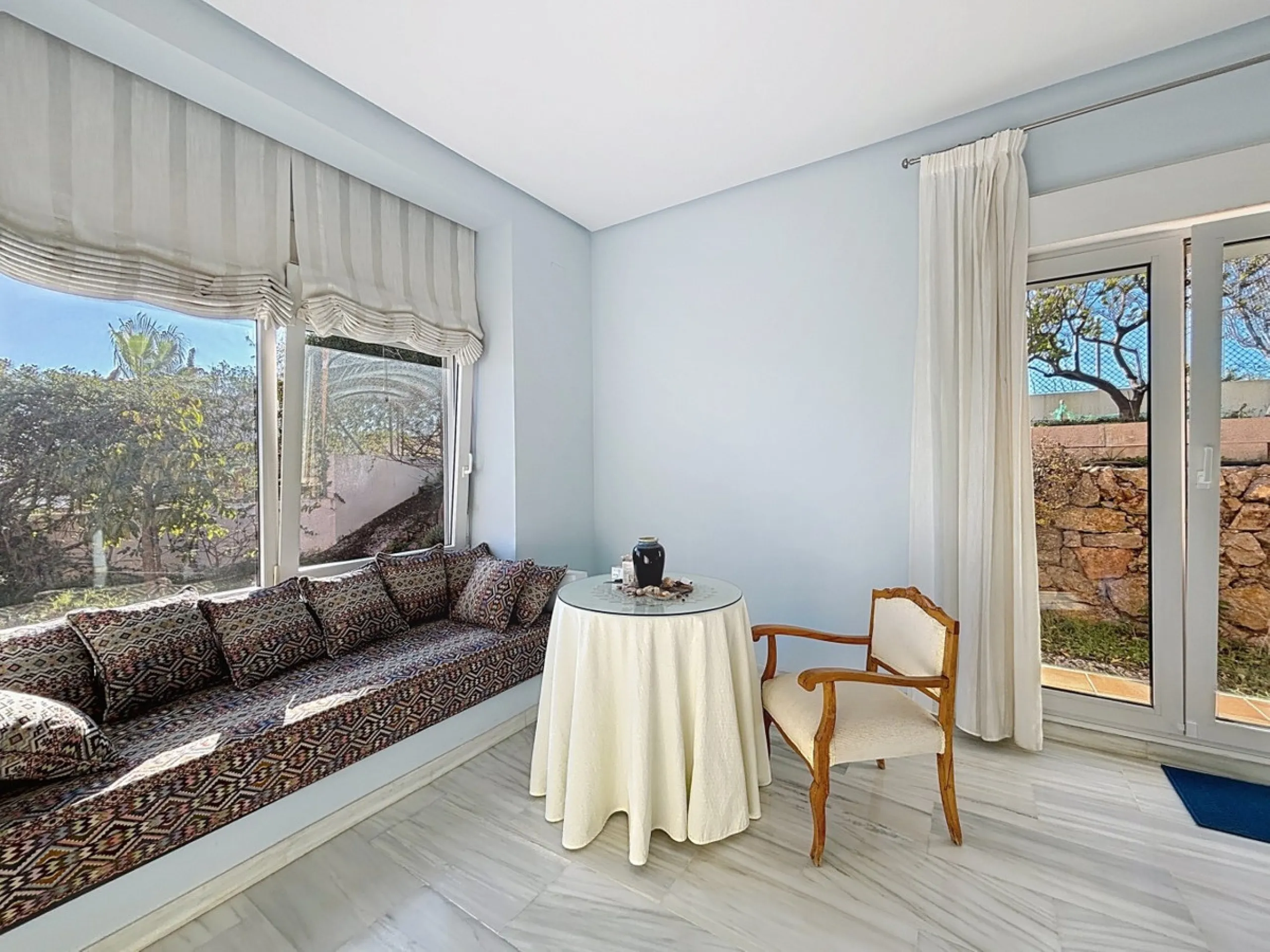 Discover your corner of paradise in this captivating three-bedroom, three-bathroom home, located in the sought-after El Capitan Urbanization. Distributed over two floors, this property perfectly combines modern comfort with the relaxed elegance of the Spa