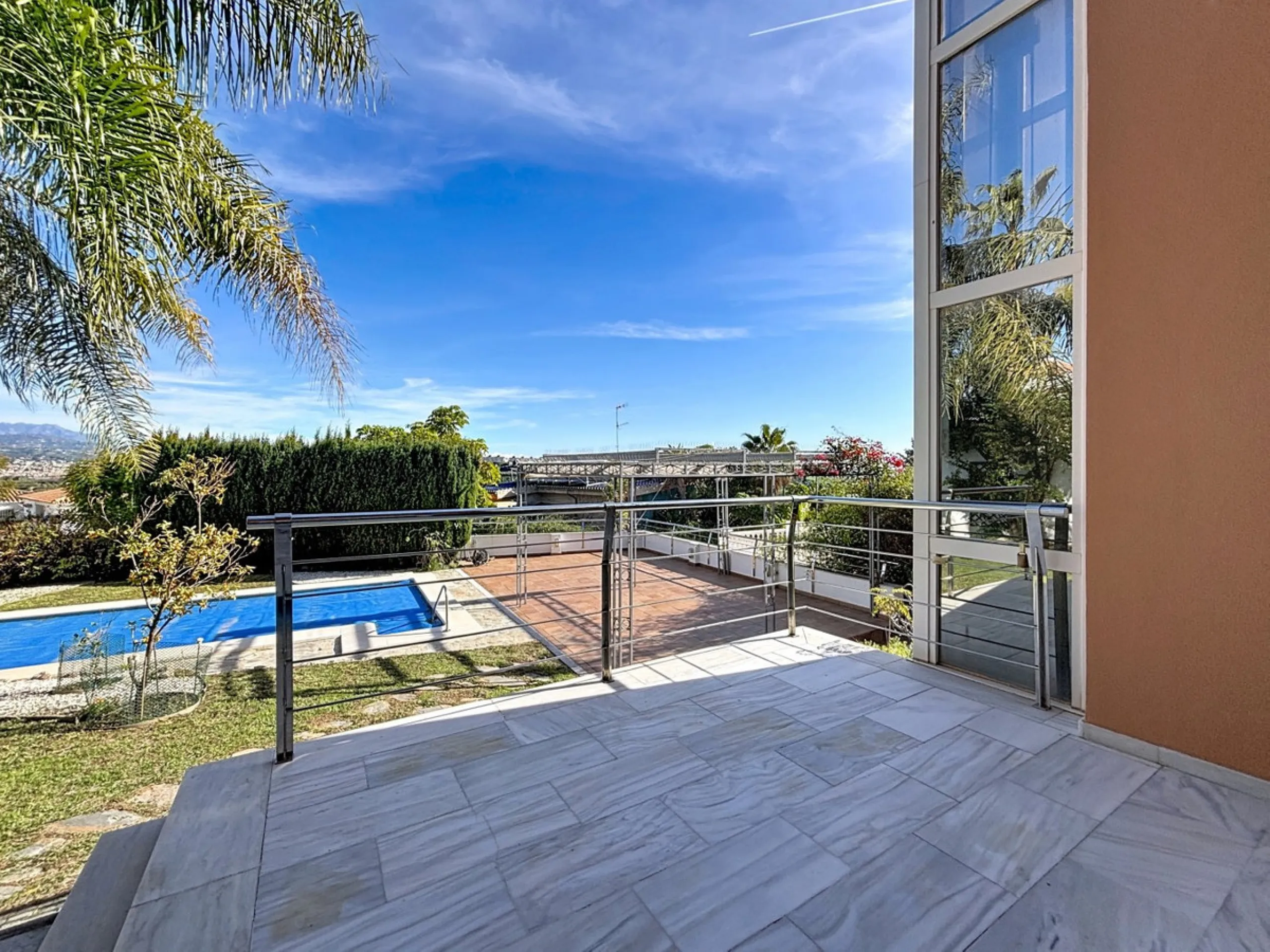 Discover your corner of paradise in this captivating three-bedroom, three-bathroom home, located in the sought-after El Capitan Urbanization. Distributed over two floors, this property perfectly combines modern comfort with the relaxed elegance of the Spa