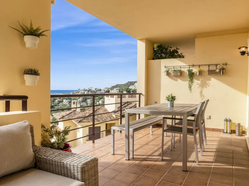 Discover this bright and elegant two bedroom first floor apartment located within the sought after Los Pinos in Los Arqueros Golf and Country Club. Set in a peaceful and secure environment, the property enjoys an elevated position with beautiful open view