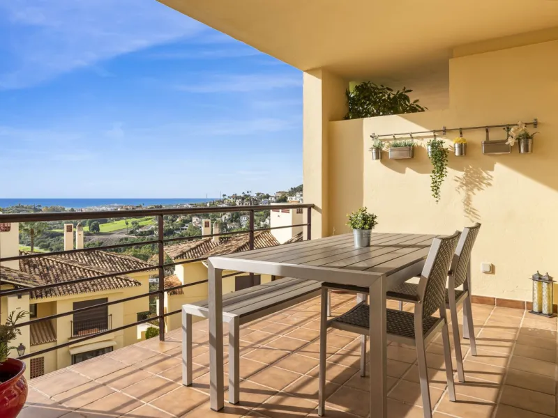 Discover this bright and elegant two bedroom first floor apartment located within the sought after Los Pinos in Los Arqueros Golf and Country Club. Set in a peaceful and secure environment, the property enjoys an elevated position with beautiful open view