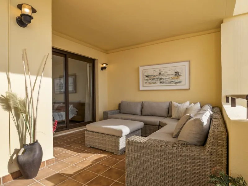 Discover this bright and elegant two bedroom first floor apartment located within the sought after Los Pinos in Los Arqueros Golf and Country Club. Set in a peaceful and secure environment, the property enjoys an elevated position with beautiful open view