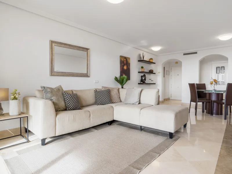 Discover this bright and elegant two bedroom first floor apartment located within the sought after Los Pinos in Los Arqueros Golf and Country Club. Set in a peaceful and secure environment, the property enjoys an elevated position with beautiful open view