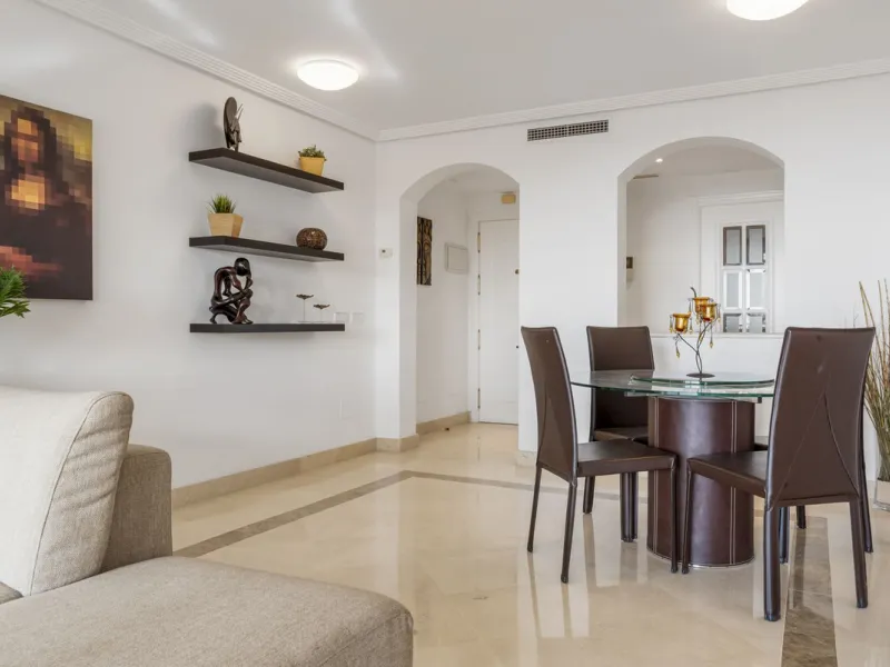 Discover this bright and elegant two bedroom first floor apartment located within the sought after Los Pinos in Los Arqueros Golf and Country Club. Set in a peaceful and secure environment, the property enjoys an elevated position with beautiful open view