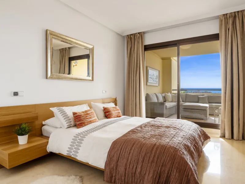 Discover this bright and elegant two bedroom first floor apartment located within the sought after Los Pinos in Los Arqueros Golf and Country Club. Set in a peaceful and secure environment, the property enjoys an elevated position with beautiful open view