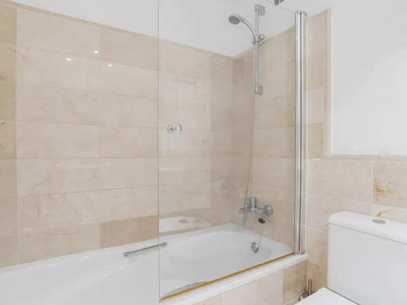 Discover this bright and elegant two bedroom first floor apartment located within the sought after Los Pinos in Los Arqueros Golf and Country Club. Set in a peaceful and secure environment, the property enjoys an elevated position with beautiful open view