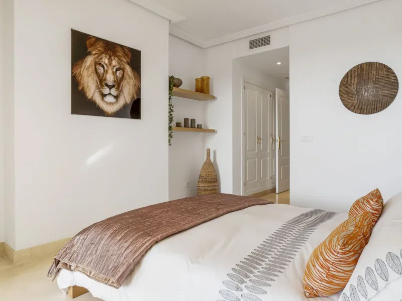 Discover this bright and elegant two bedroom first floor apartment located within the sought after Los Pinos in Los Arqueros Golf and Country Club. Set in a peaceful and secure environment, the property enjoys an elevated position with beautiful open view