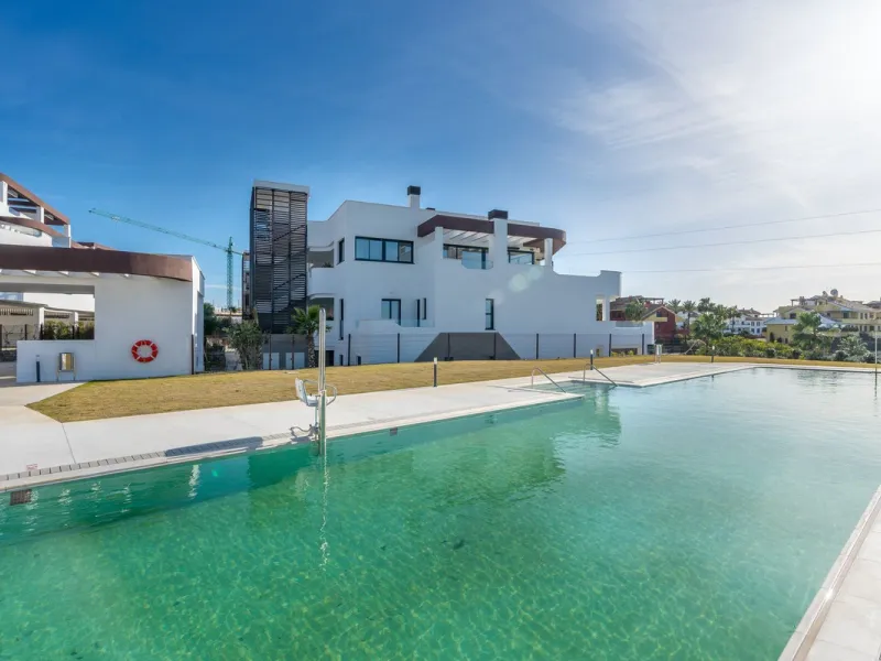 Exclusive ground floor apartment with private garden located in a modern resort-style residential complex in Cancelada, on the prestigious New  Milla de Oro (**Estepona**).