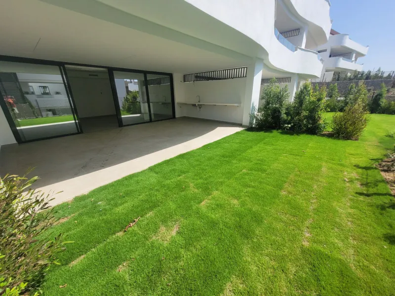 Exclusive ground floor apartment with private garden located in a modern resort-style residential complex in Cancelada, on the prestigious New  Milla de Oro (**Estepona**).