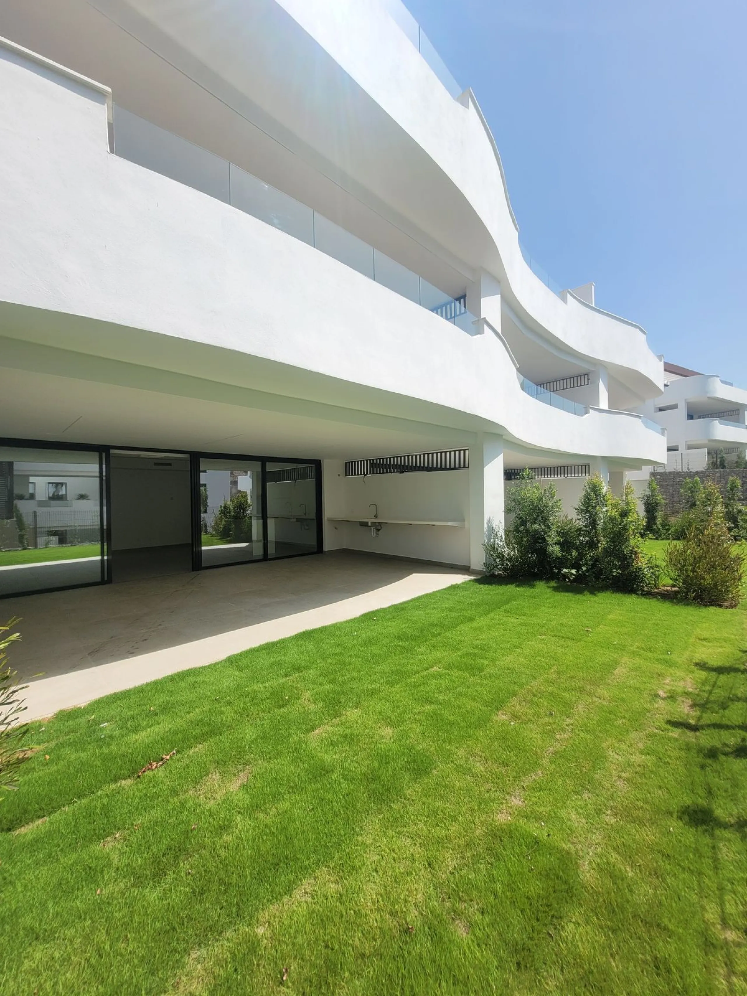 Exclusive ground floor apartment with private garden located in a modern resort-style residential complex in Cancelada, on the prestigious New  Milla de Oro (**Estepona**).