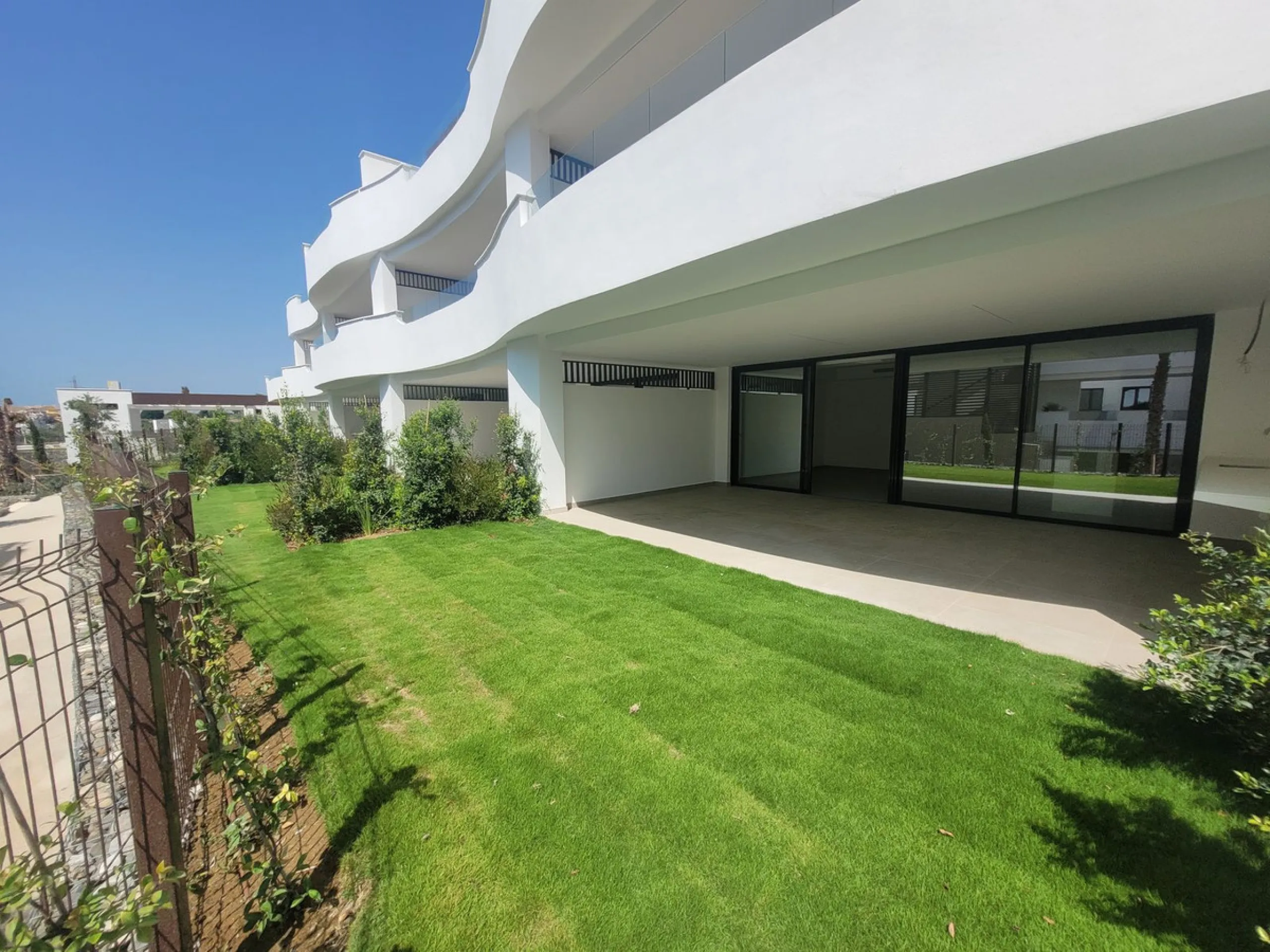 Exclusive ground floor apartment with private garden located in a modern resort-style residential complex in Cancelada, on the prestigious New  Milla de Oro (**Estepona**).