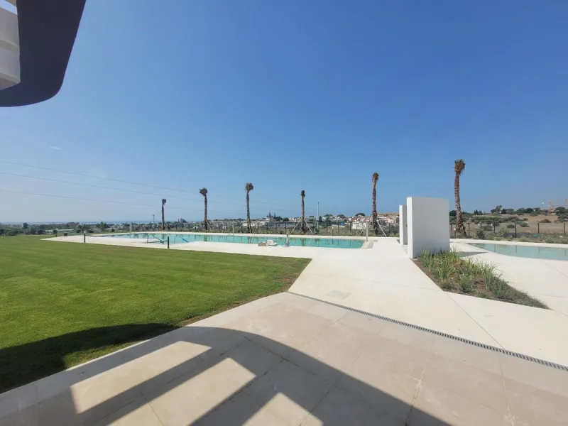 Exclusive ground floor apartment with private garden located in a modern resort-style residential complex in Cancelada, on the prestigious New  Milla de Oro (**Estepona**).