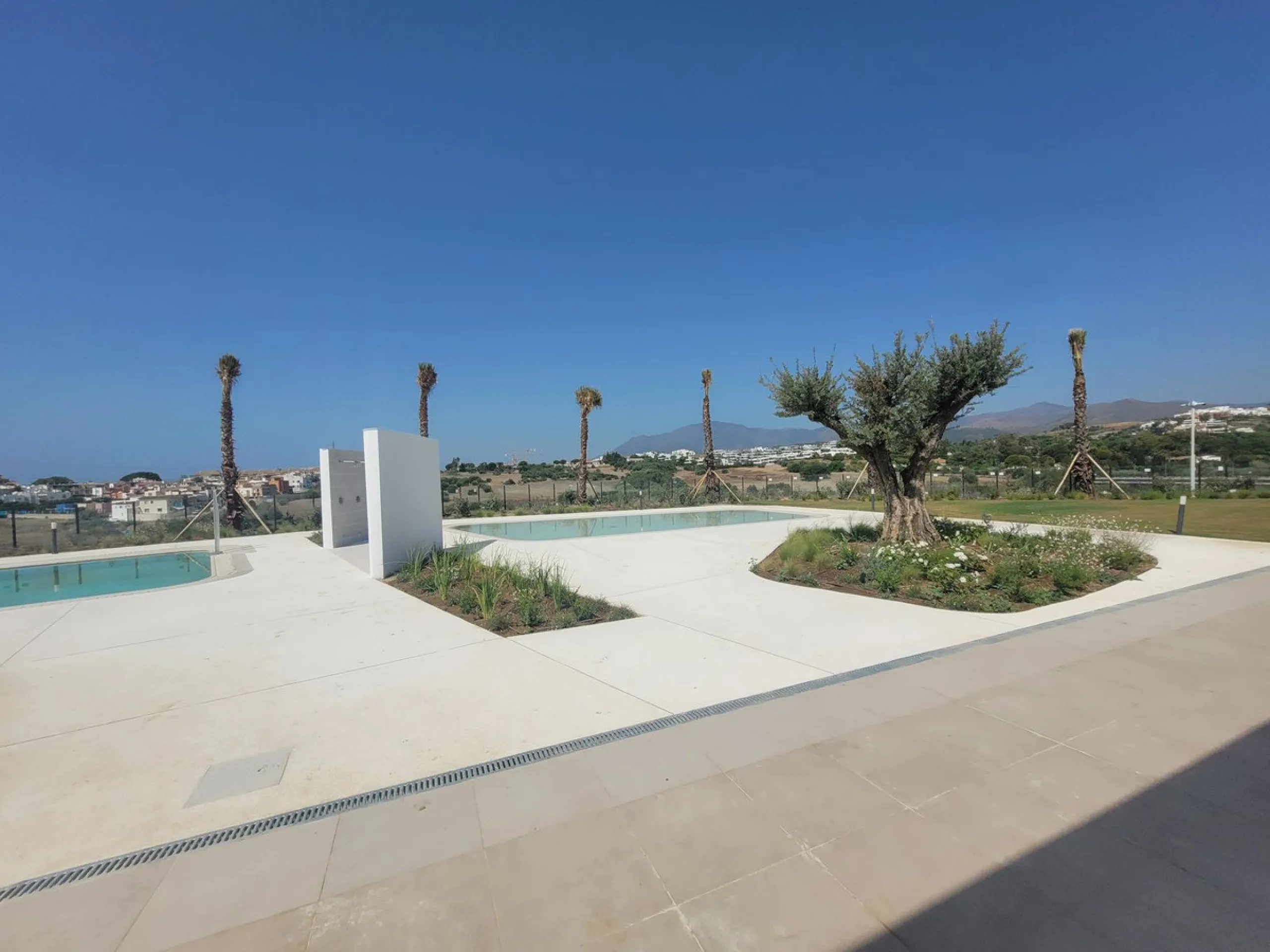 Exclusive ground floor apartment with private garden located in a modern resort-style residential complex in Cancelada, on the prestigious New  Milla de Oro (**Estepona**).