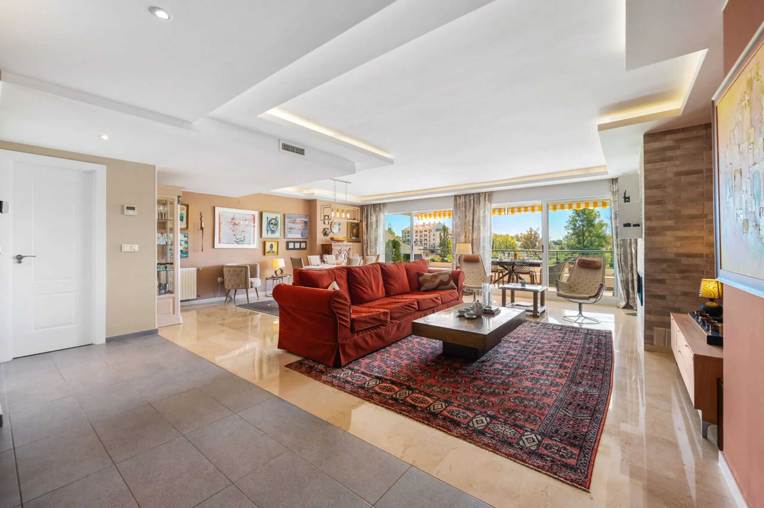 This truly special home combines space, light and tranquility in one of Guadalmina's most sought-after settings. Located on the first floor yet elevated above the golf course, the apartment enjoys the feel of a third floor or penthouse, with uninterrupted