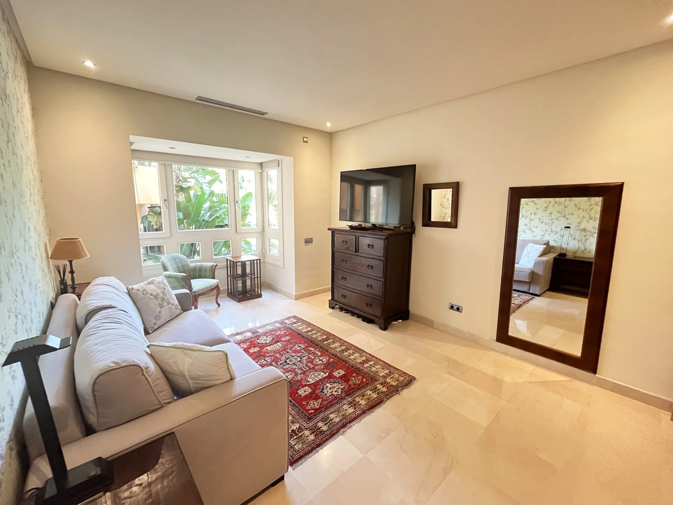 Located within the prestigious gated community Mansion Club, this elegant 2-bedroom, 2-bathroom apartment stands out as one of the finest residential offerings in the area. With a built area of 165 m² and a 41 m² south-facing terrace, it offers generous l