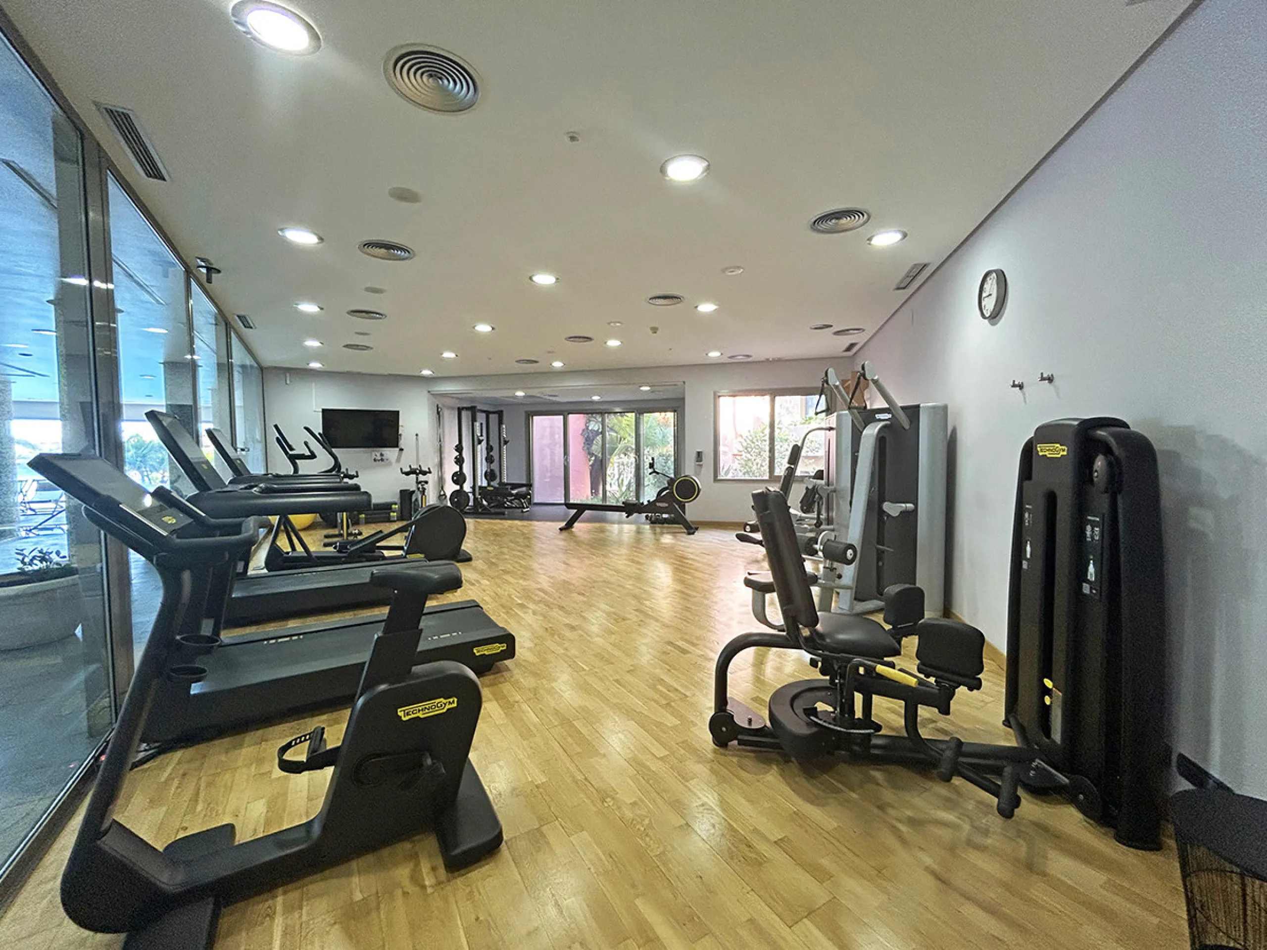 Located within the prestigious gated community Mansion Club, this elegant 2-bedroom, 2-bathroom apartment stands out as one of the finest residential offerings in the area. With a built area of 165 m² and a 41 m² south-facing terrace, it offers generous l