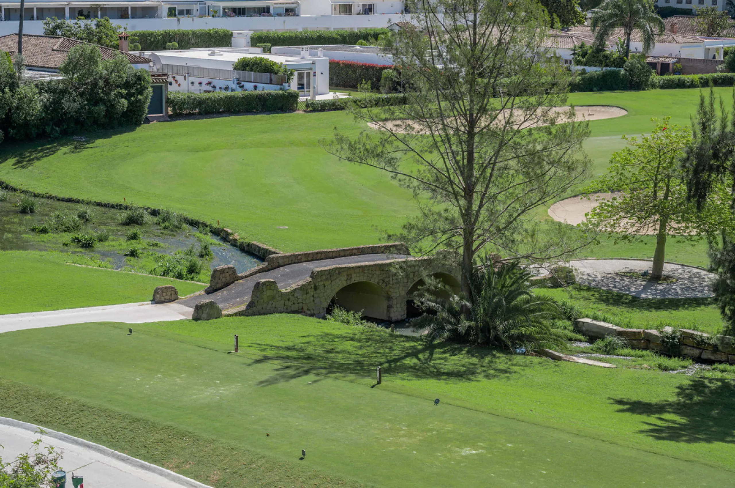 This truly special home combines space, light and tranquility in one of Guadalmina's most sought-after settings. Located on the first floor yet elevated above the golf course, the apartment enjoys the feel of a third floor or penthouse, with uninterrupted