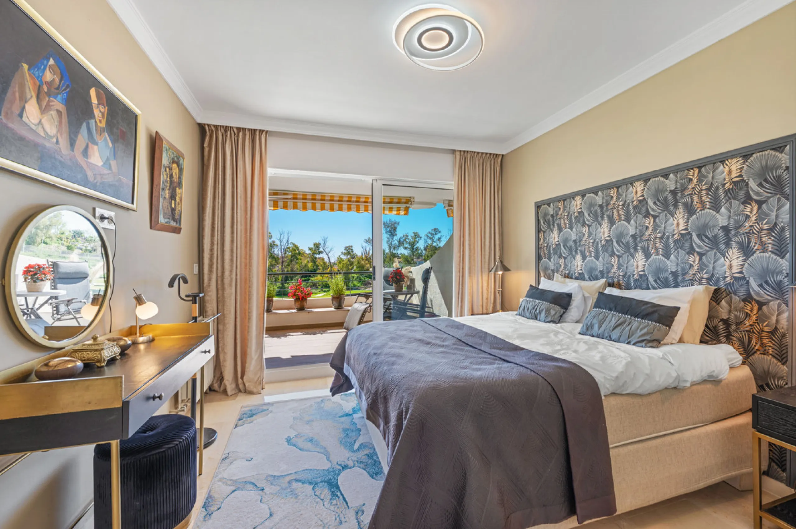 This truly special home combines space, light and tranquility in one of Guadalmina's most sought-after settings. Located on the first floor yet elevated above the golf course, the apartment enjoys the feel of a third floor or penthouse, with uninterrupted