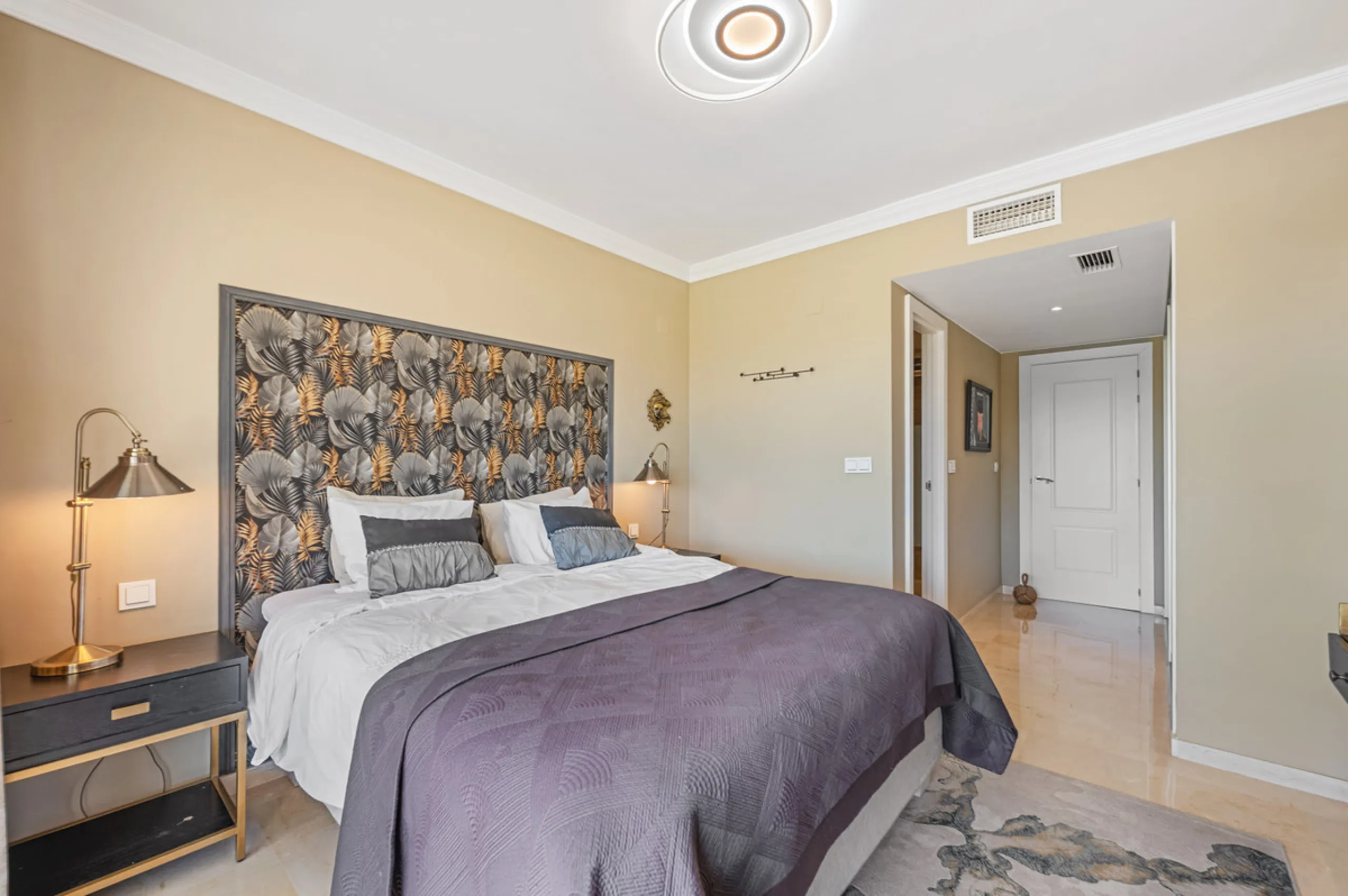 This truly special home combines space, light and tranquility in one of Guadalmina's most sought-after settings. Located on the first floor yet elevated above the golf course, the apartment enjoys the feel of a third floor or penthouse, with uninterrupted