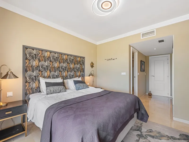 This truly special home combines space, light and tranquility in one of Guadalmina's most sought-after settings. Located on the first floor yet elevated above the golf course, the apartment enjoys the feel of a third floor or penthouse, with uninterrupted