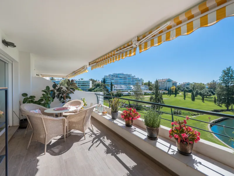 This truly special home combines space, light and tranquility in one of Guadalmina's most sought-after settings. Located on the first floor yet elevated above the golf course, the apartment enjoys the feel of a third floor or penthouse, with uninterrupted