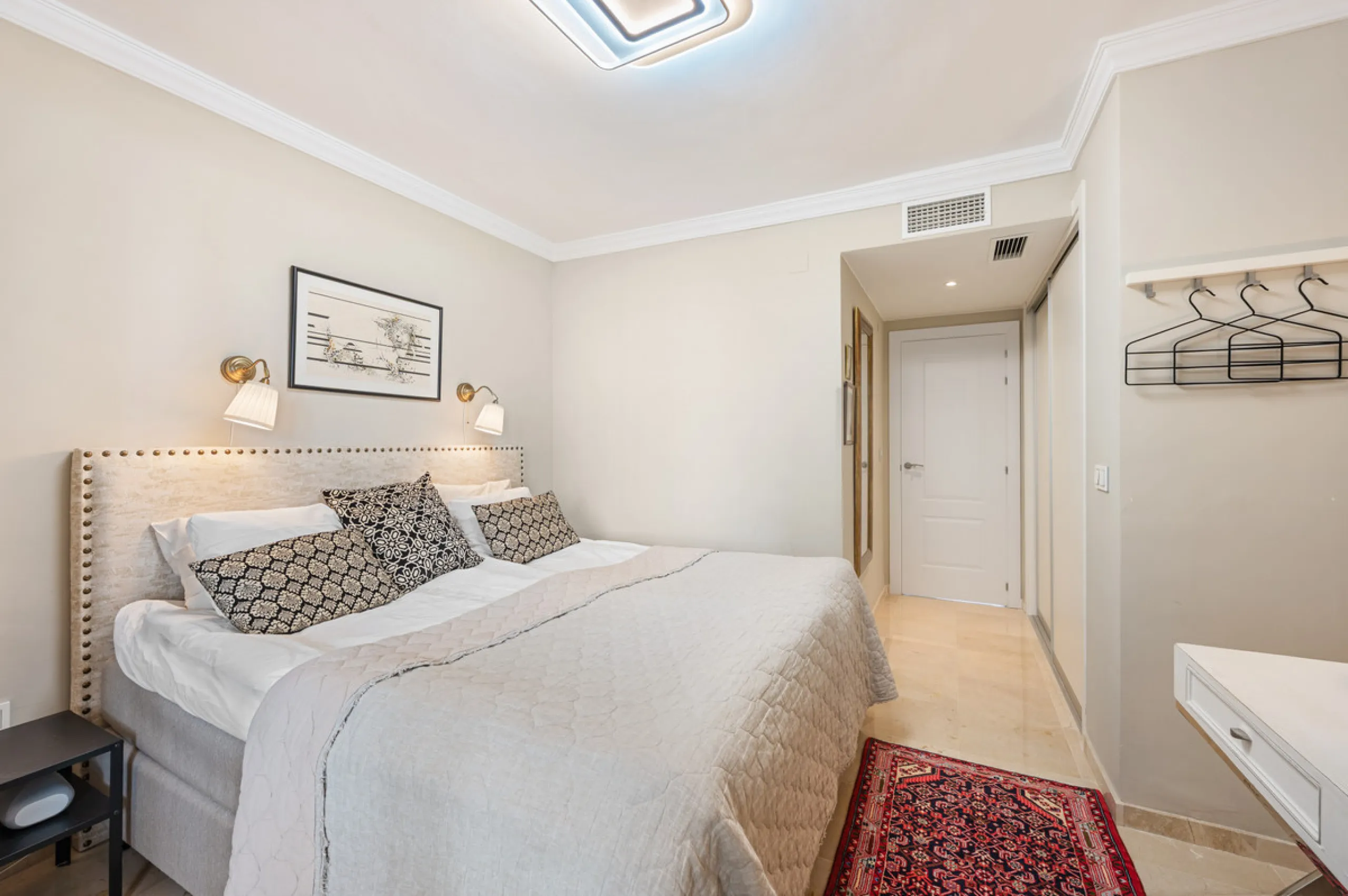 This truly special home combines space, light and tranquility in one of Guadalmina's most sought-after settings. Located on the first floor yet elevated above the golf course, the apartment enjoys the feel of a third floor or penthouse, with uninterrupted