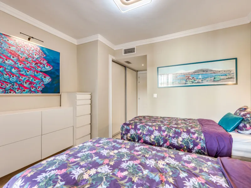 This truly special home combines space, light and tranquility in one of Guadalmina's most sought-after settings. Located on the first floor yet elevated above the golf course, the apartment enjoys the feel of a third floor or penthouse, with uninterrupted