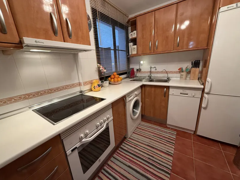 Apartment for sale on the first floor (not ground floor) with 2 bedrooms and 2 bathrooms, located on the second line to the beach in Fuengirola, Los Boliches area.