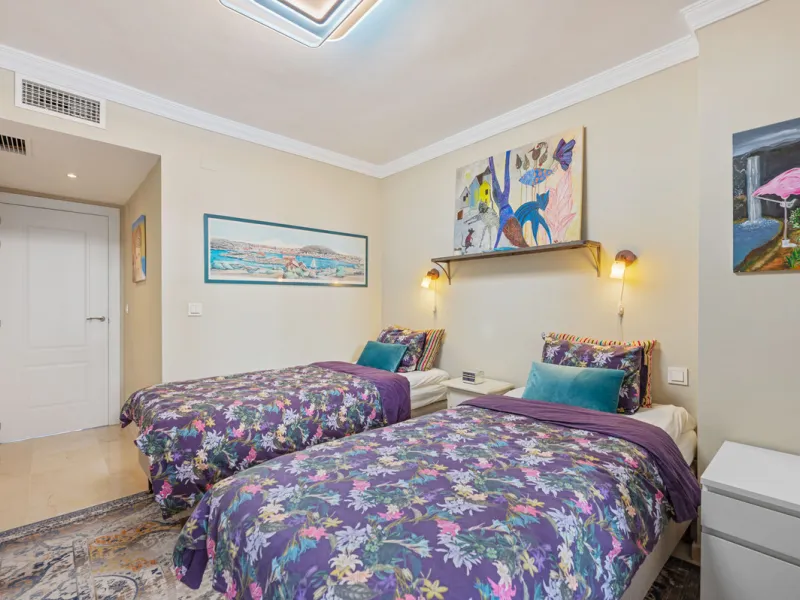 This truly special home combines space, light and tranquility in one of Guadalmina's most sought-after settings. Located on the first floor yet elevated above the golf course, the apartment enjoys the feel of a third floor or penthouse, with uninterrupted