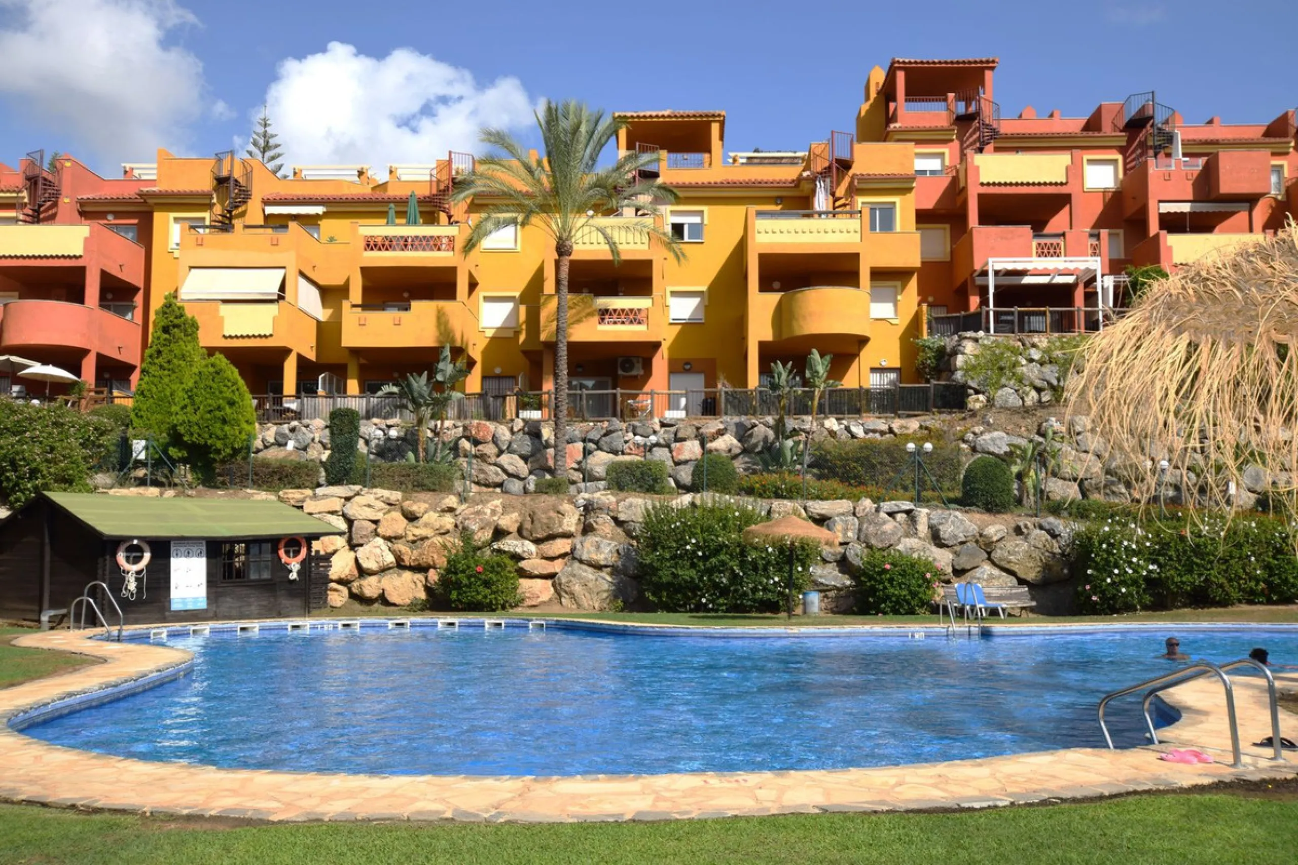 This is an immaculately presented penthouse in La Reserva de Marbella just minutes from Cabopino, Elviria and their lovely beaches. This penthouse has a large west facing terrace which offers great winter sun and sea views and upstairs is a huge roof terr
