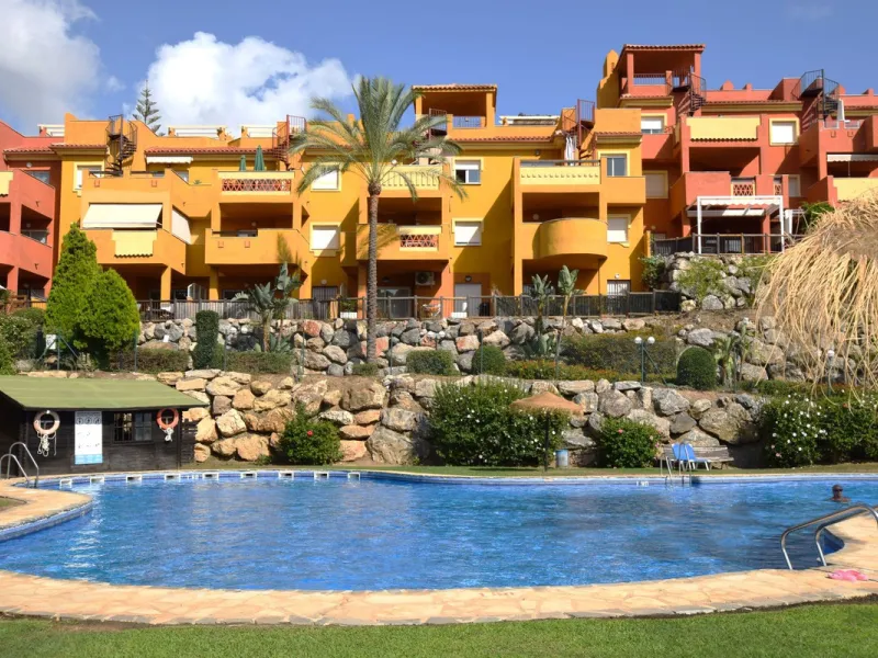 This is an immaculately presented penthouse in La Reserva de Marbella just minutes from Cabopino, Elviria and their lovely beaches. This penthouse has a large west facing terrace which offers great winter sun and sea views and upstairs is a huge roof terr