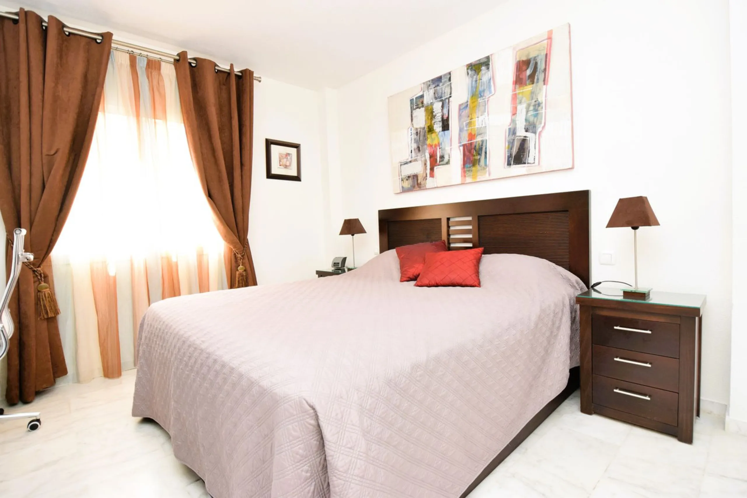 This is an immaculately presented penthouse in La Reserva de Marbella just minutes from Cabopino, Elviria and their lovely beaches. This penthouse has a large west facing terrace which offers great winter sun and sea views and upstairs is a huge roof terr