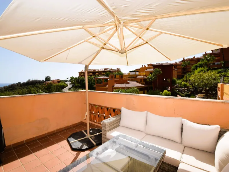 This is an immaculately presented penthouse in La Reserva de Marbella just minutes from Cabopino, Elviria and their lovely beaches. This penthouse has a large west facing terrace which offers great winter sun and sea views and upstairs is a huge roof terr