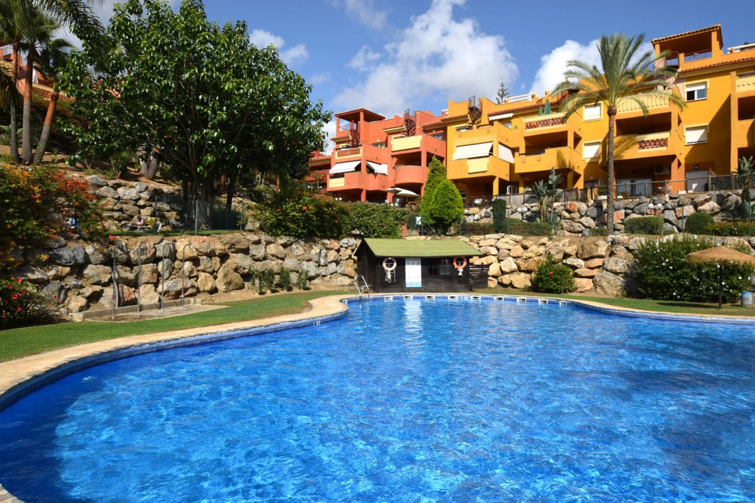 This is an immaculately presented penthouse in La Reserva de Marbella just minutes from Cabopino, Elviria and their lovely beaches. This penthouse has a large west facing terrace which offers great winter sun and sea views and upstairs is a huge roof terr
