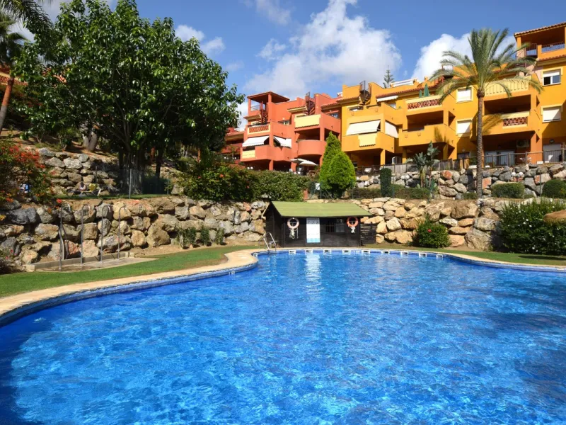 This is an immaculately presented penthouse in La Reserva de Marbella just minutes from Cabopino, Elviria and their lovely beaches. This penthouse has a large west facing terrace which offers great winter sun and sea views and upstairs is a huge roof terr