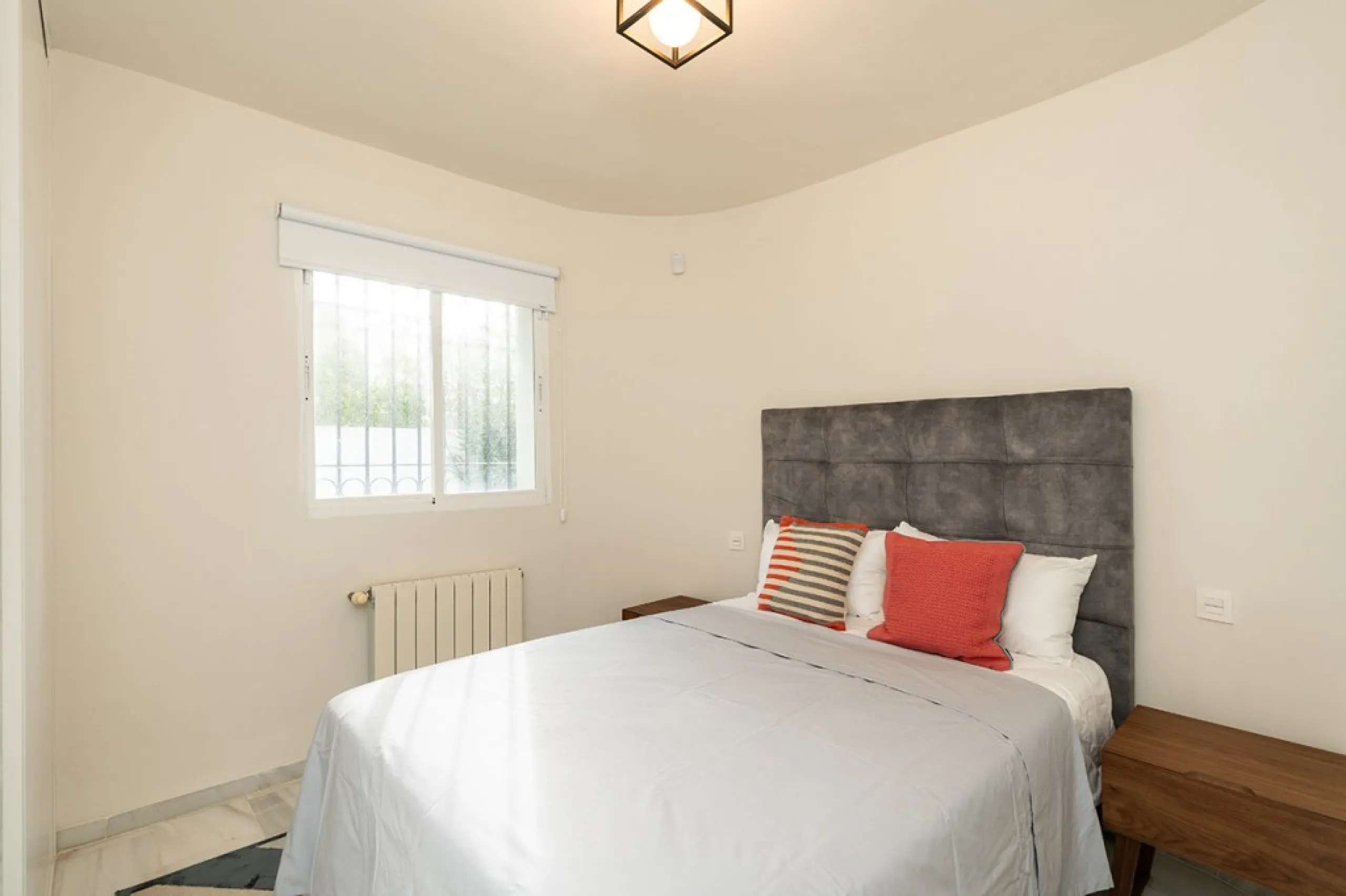 Just 50 metres from the beach, this beautifully renovated and modernised four bedroom, three bathroom villa is set on a spacious, flat plot featuring a large swimming pool and lush mature garden. The property boasts a fully upgraded kitchen and bathrooms,