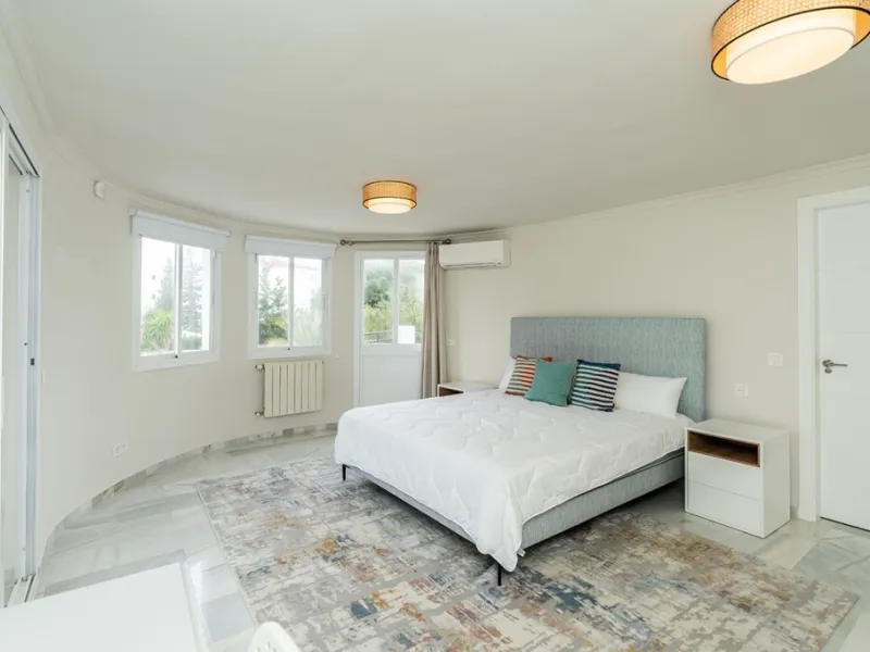Just 50 metres from the beach, this beautifully renovated and modernised four bedroom, three bathroom villa is set on a spacious, flat plot featuring a large swimming pool and lush mature garden. The property boasts a fully upgraded kitchen and bathrooms,