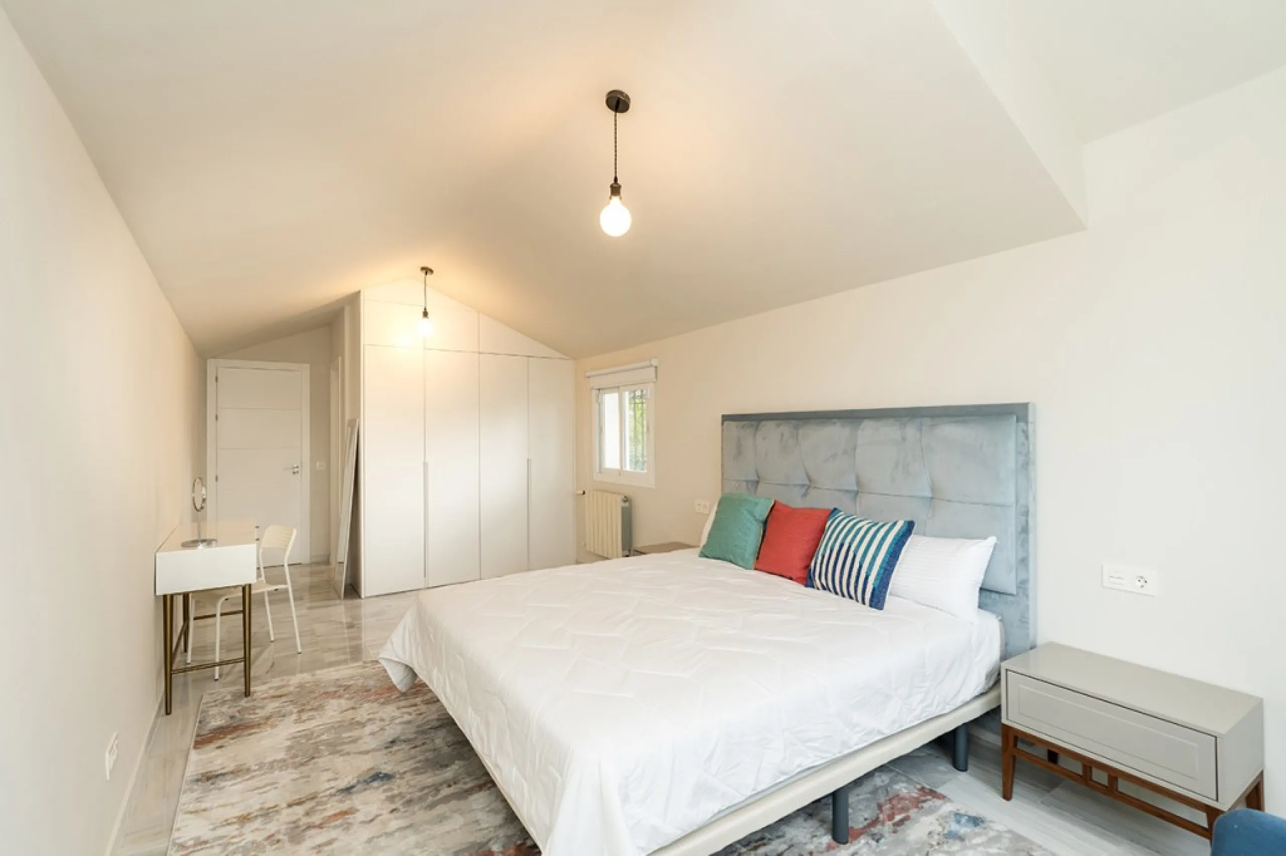 Just 50 metres from the beach, this beautifully renovated and modernised four bedroom, three bathroom villa is set on a spacious, flat plot featuring a large swimming pool and lush mature garden. The property boasts a fully upgraded kitchen and bathrooms,