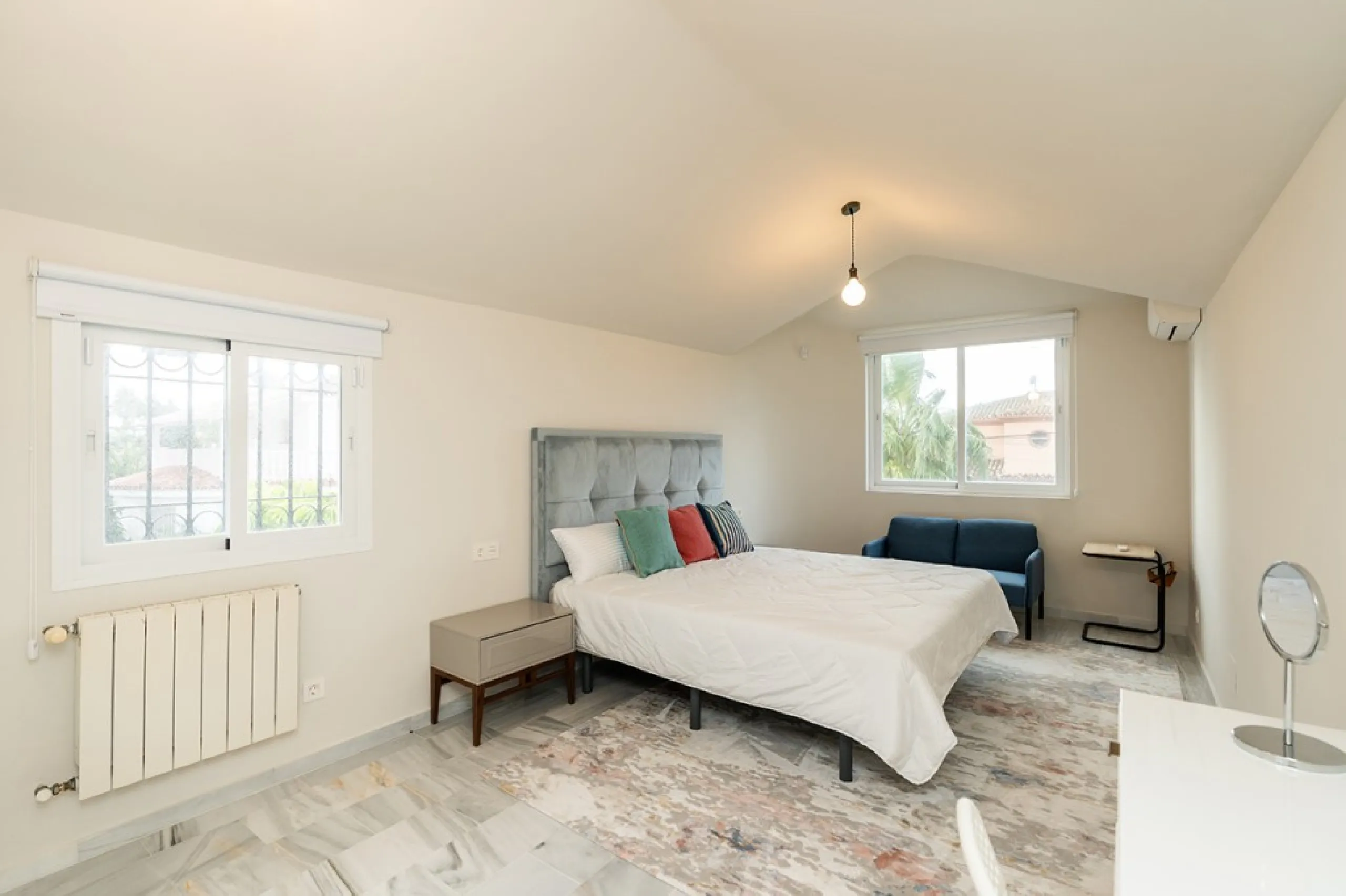 Just 50 metres from the beach, this beautifully renovated and modernised four bedroom, three bathroom villa is set on a spacious, flat plot featuring a large swimming pool and lush mature garden. The property boasts a fully upgraded kitchen and bathrooms,