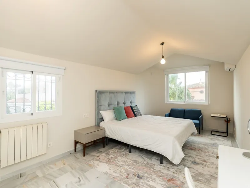Just 50 metres from the beach, this beautifully renovated and modernised four bedroom, three bathroom villa is set on a spacious, flat plot featuring a large swimming pool and lush mature garden. The property boasts a fully upgraded kitchen and bathrooms,
