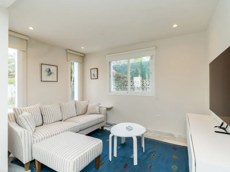 Just 50 metres from the beach, this beautifully renovated and modernised four bedroom, three bathroom villa is set on a spacious, flat plot featuring a large swimming pool and lush mature garden. The property boasts a fully upgraded kitchen and bathrooms,