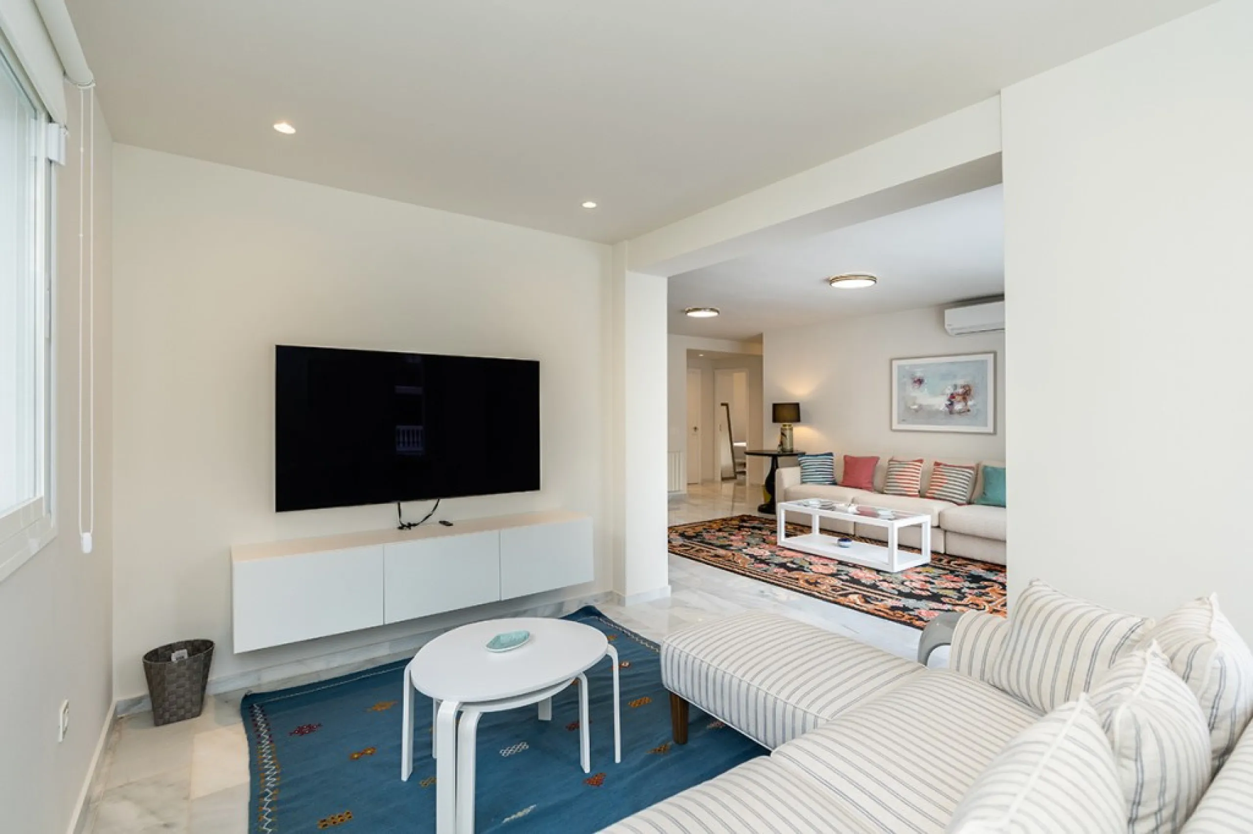 Just 50 metres from the beach, this beautifully renovated and modernised four bedroom, three bathroom villa is set on a spacious, flat plot featuring a large swimming pool and lush mature garden. The property boasts a fully upgraded kitchen and bathrooms,