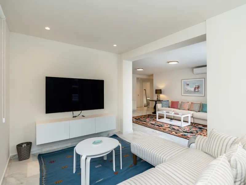 Just 50 metres from the beach, this beautifully renovated and modernised four bedroom, three bathroom villa is set on a spacious, flat plot featuring a large swimming pool and lush mature garden. The property boasts a fully upgraded kitchen and bathrooms,