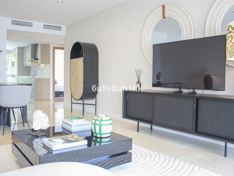 Located on Marbella's prestigious Golden Mile, this refined apartment in Las Cañas Beach perfectly balances timeless elegance with the comfort of a true home. Recently renovated and thoughtfully furnished with premium materials, it's offered exactly as it