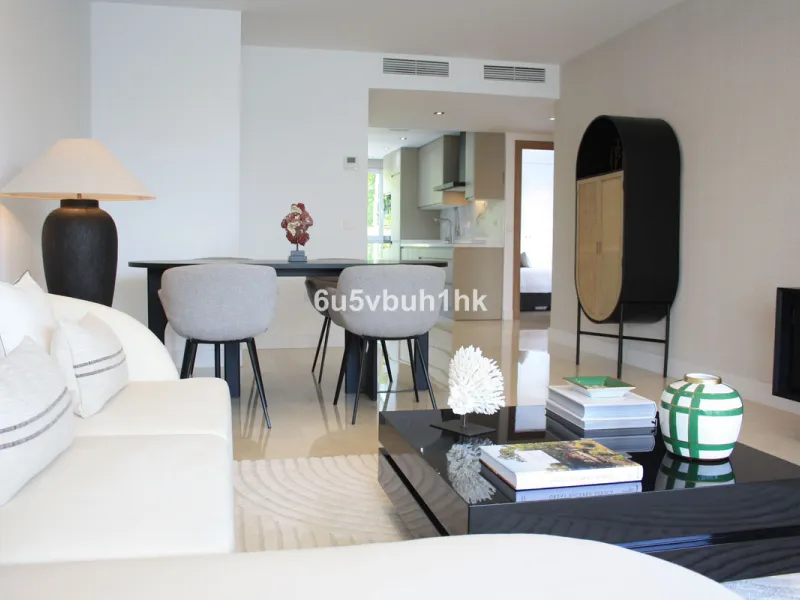 Located on Marbella's prestigious Golden Mile, this refined apartment in Las Cañas Beach perfectly balances timeless elegance with the comfort of a true home. Recently renovated and thoughtfully furnished with premium materials, it's offered exactly as it