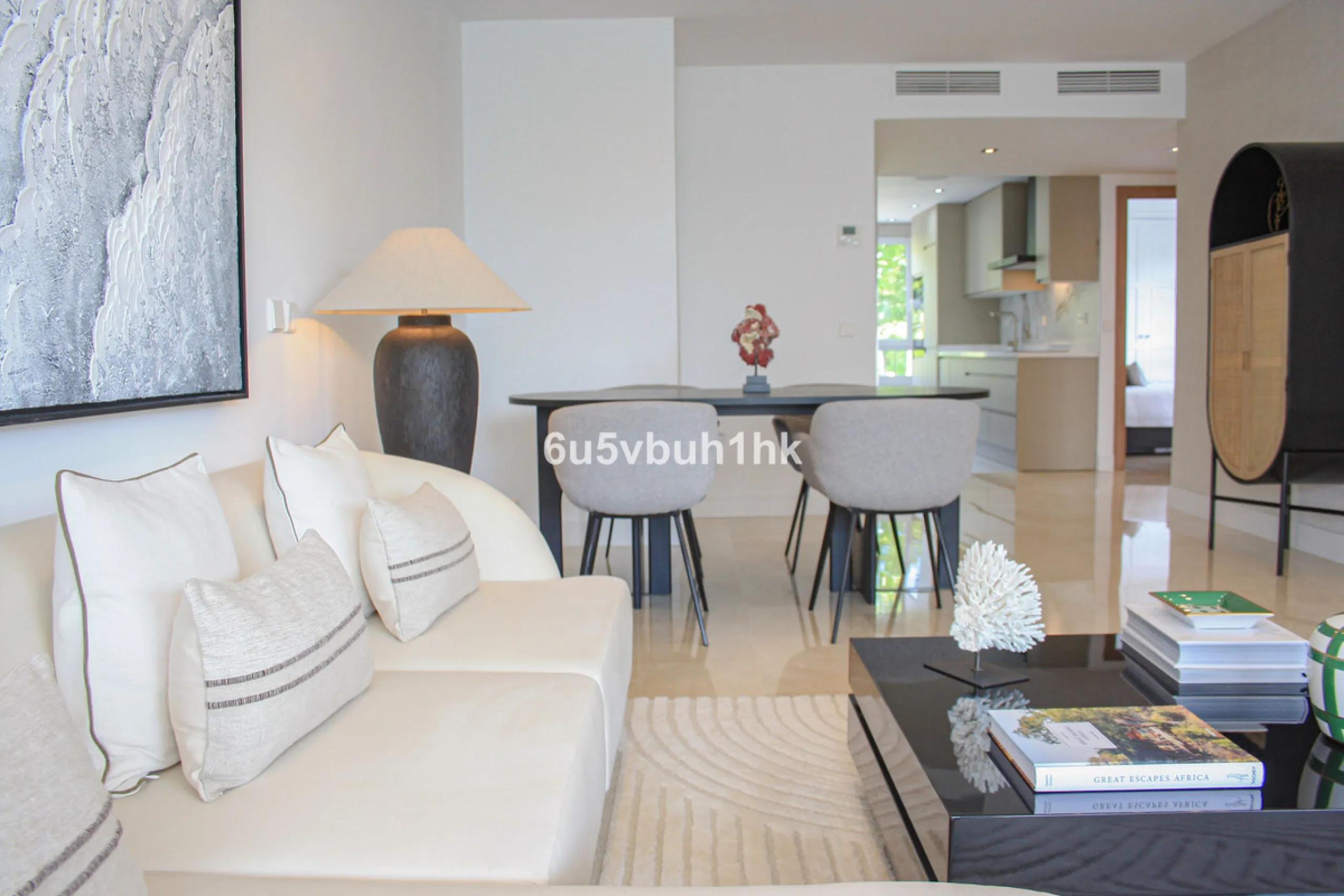 Located on Marbella's prestigious Golden Mile, this refined apartment in Las Cañas Beach perfectly balances timeless elegance with the comfort of a true home. Recently renovated and thoughtfully furnished with premium materials, it's offered exactly as it