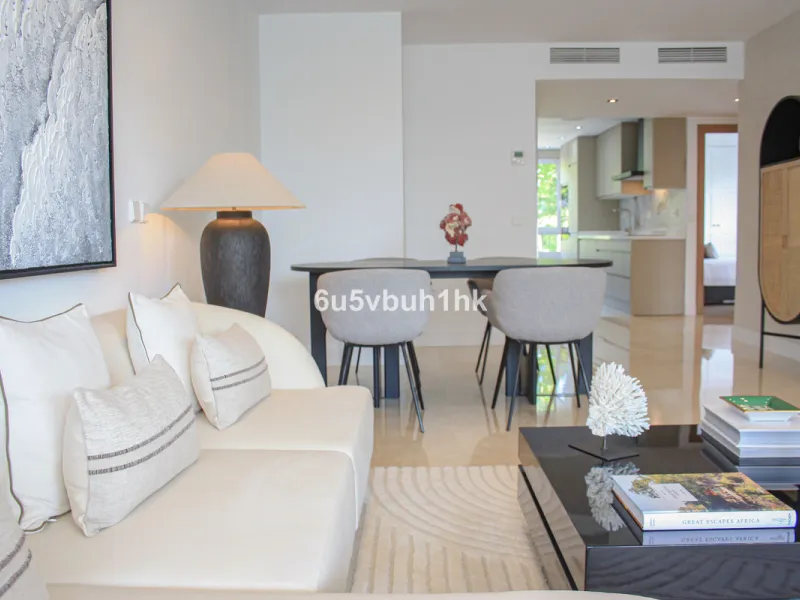 Located on Marbella's prestigious Golden Mile, this refined apartment in Las Cañas Beach perfectly balances timeless elegance with the comfort of a true home. Recently renovated and thoughtfully furnished with premium materials, it's offered exactly as it