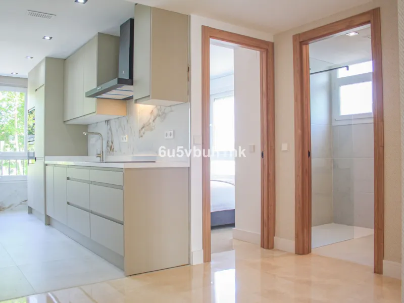 Located on Marbella's prestigious Golden Mile, this refined apartment in Las Cañas Beach perfectly balances timeless elegance with the comfort of a true home. Recently renovated and thoughtfully furnished with premium materials, it's offered exactly as it