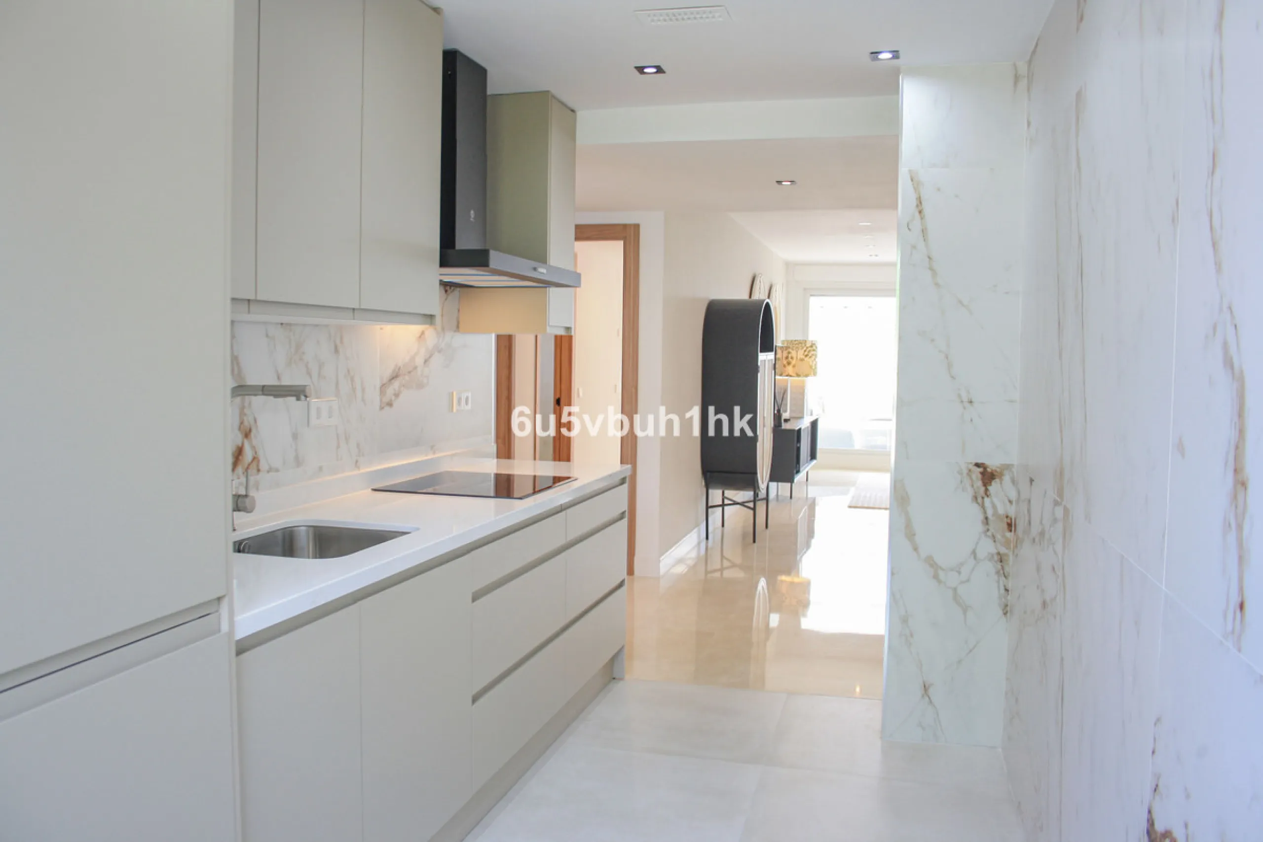 Located on Marbella's prestigious Golden Mile, this refined apartment in Las Cañas Beach perfectly balances timeless elegance with the comfort of a true home. Recently renovated and thoughtfully furnished with premium materials, it's offered exactly as it