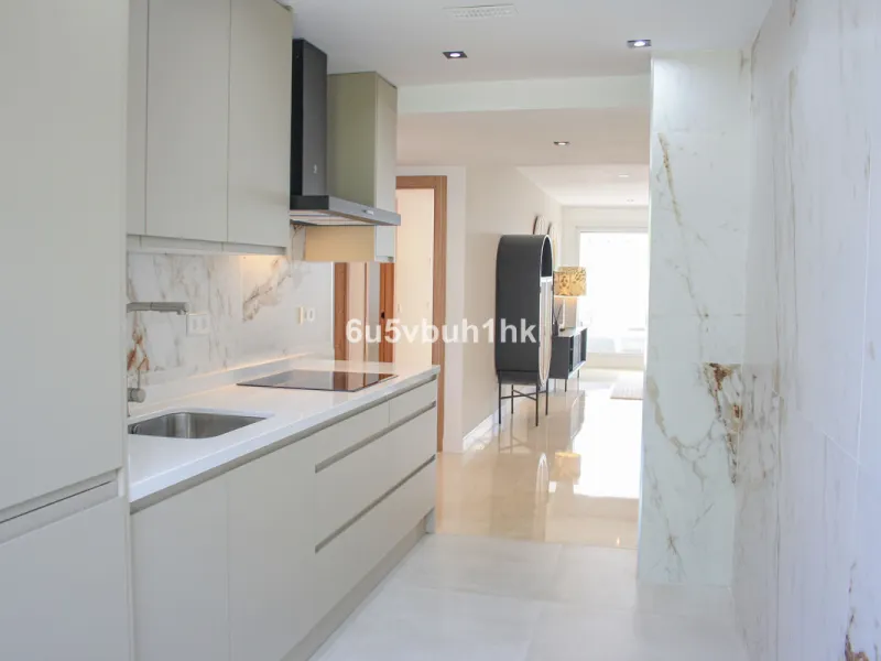 Located on Marbella's prestigious Golden Mile, this refined apartment in Las Cañas Beach perfectly balances timeless elegance with the comfort of a true home. Recently renovated and thoughtfully furnished with premium materials, it's offered exactly as it