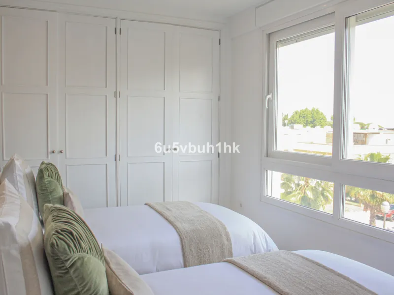 Located on Marbella's prestigious Golden Mile, this refined apartment in Las Cañas Beach perfectly balances timeless elegance with the comfort of a true home. Recently renovated and thoughtfully furnished with premium materials, it's offered exactly as it